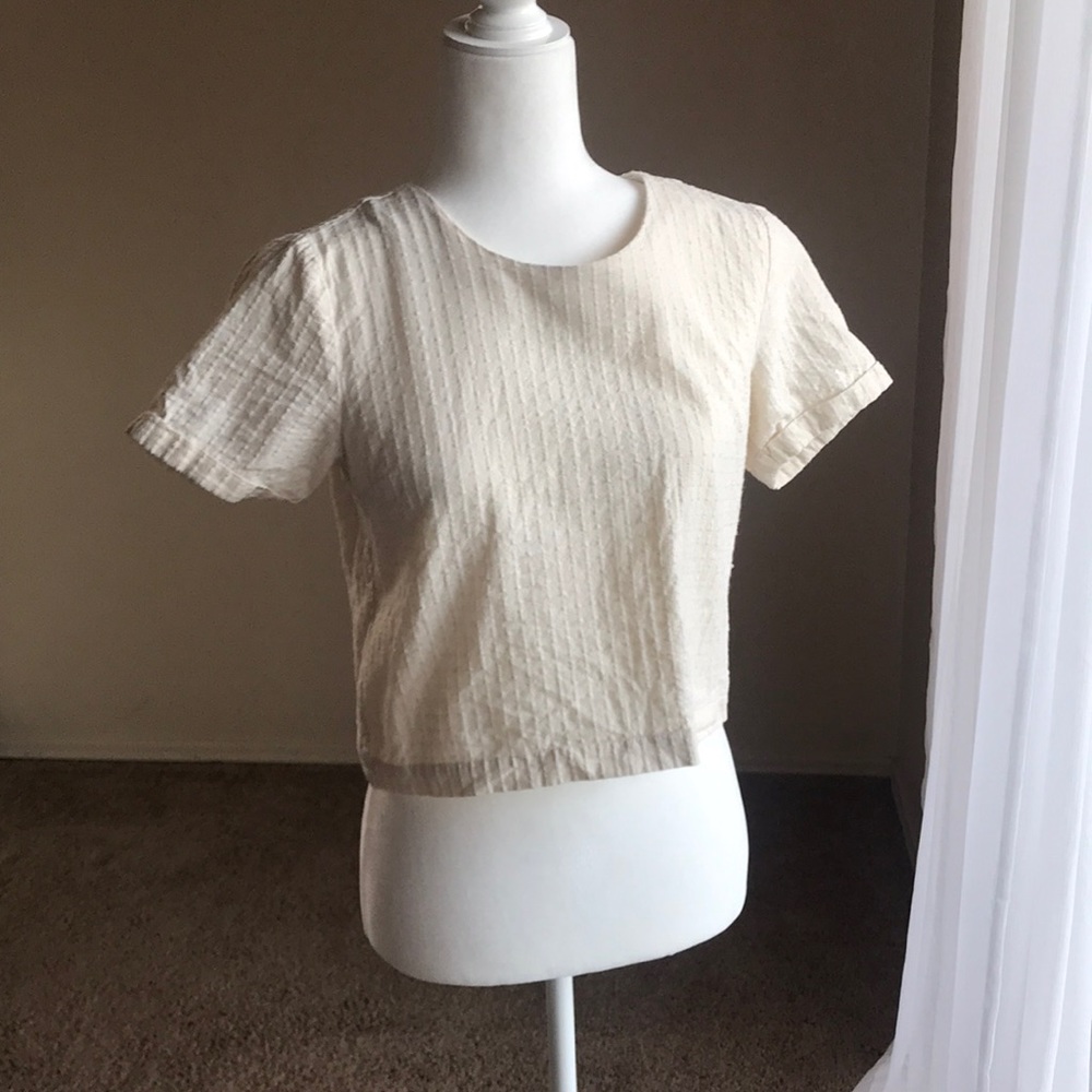 Cream crop top with buttons in the back